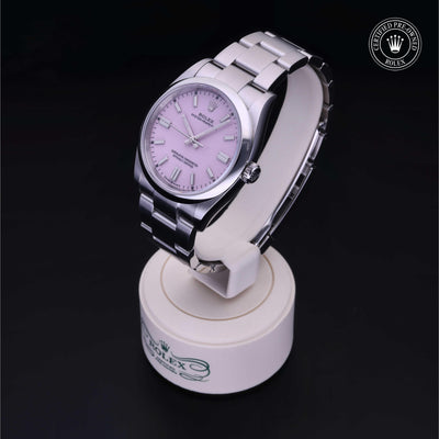 Rolex Certified Pre-owned Oyster Perpetual M126000-0008 front on black background