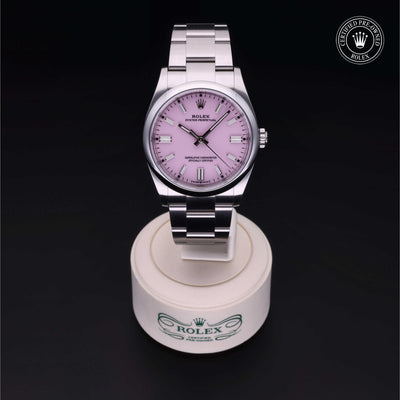 Rolex Certified Pre-owned Oyster Perpetual M126000-0008 front on black background