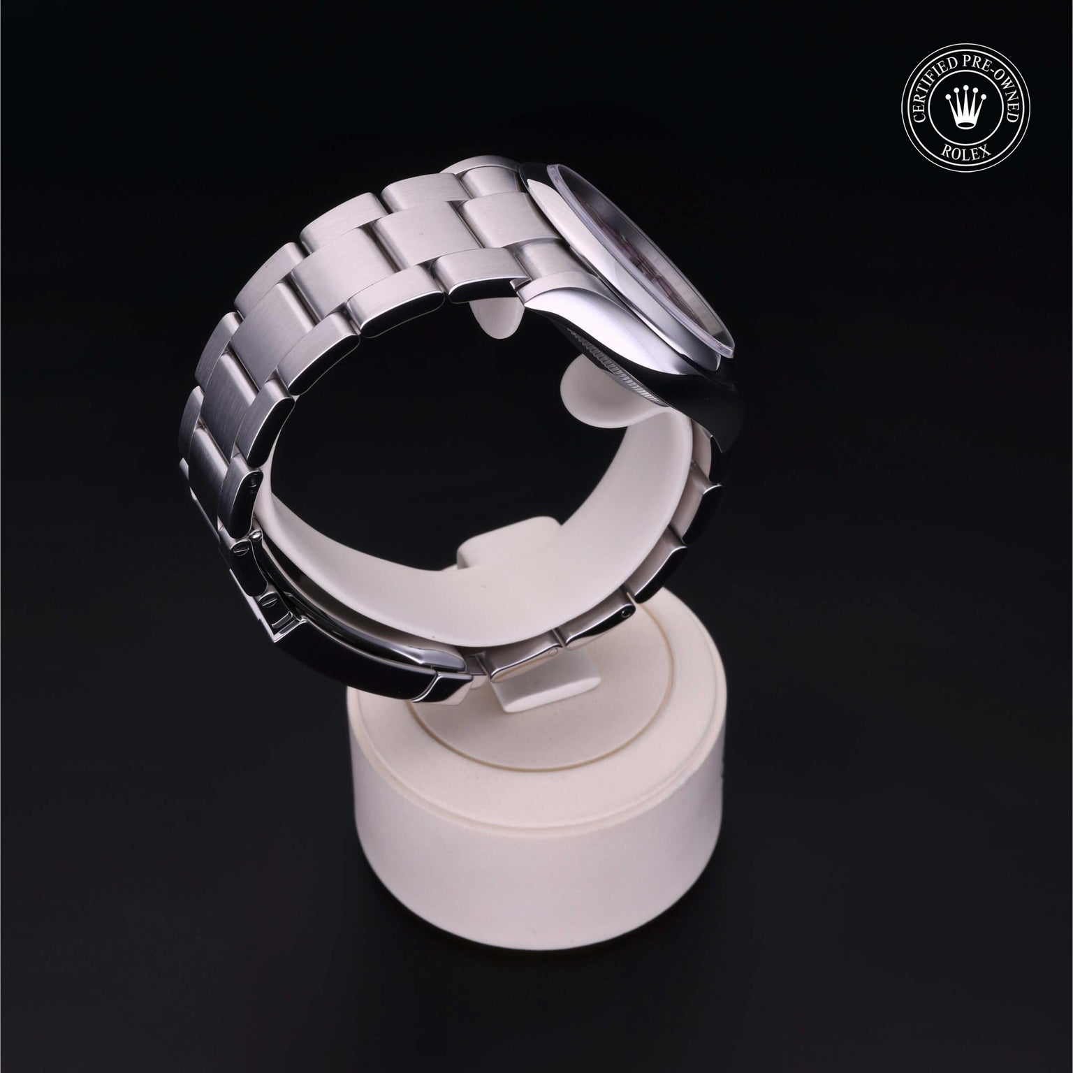 Rolex Certified Pre-owned Oyster Perpetual M126000-0008 front on black background