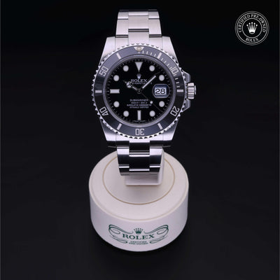 Rolex Certified Pre-owned Submariner M116610LN-0001 front on black background