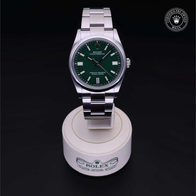 Rolex Certified Pre-owned Oyster Perpetual M126000-0005 front on black background