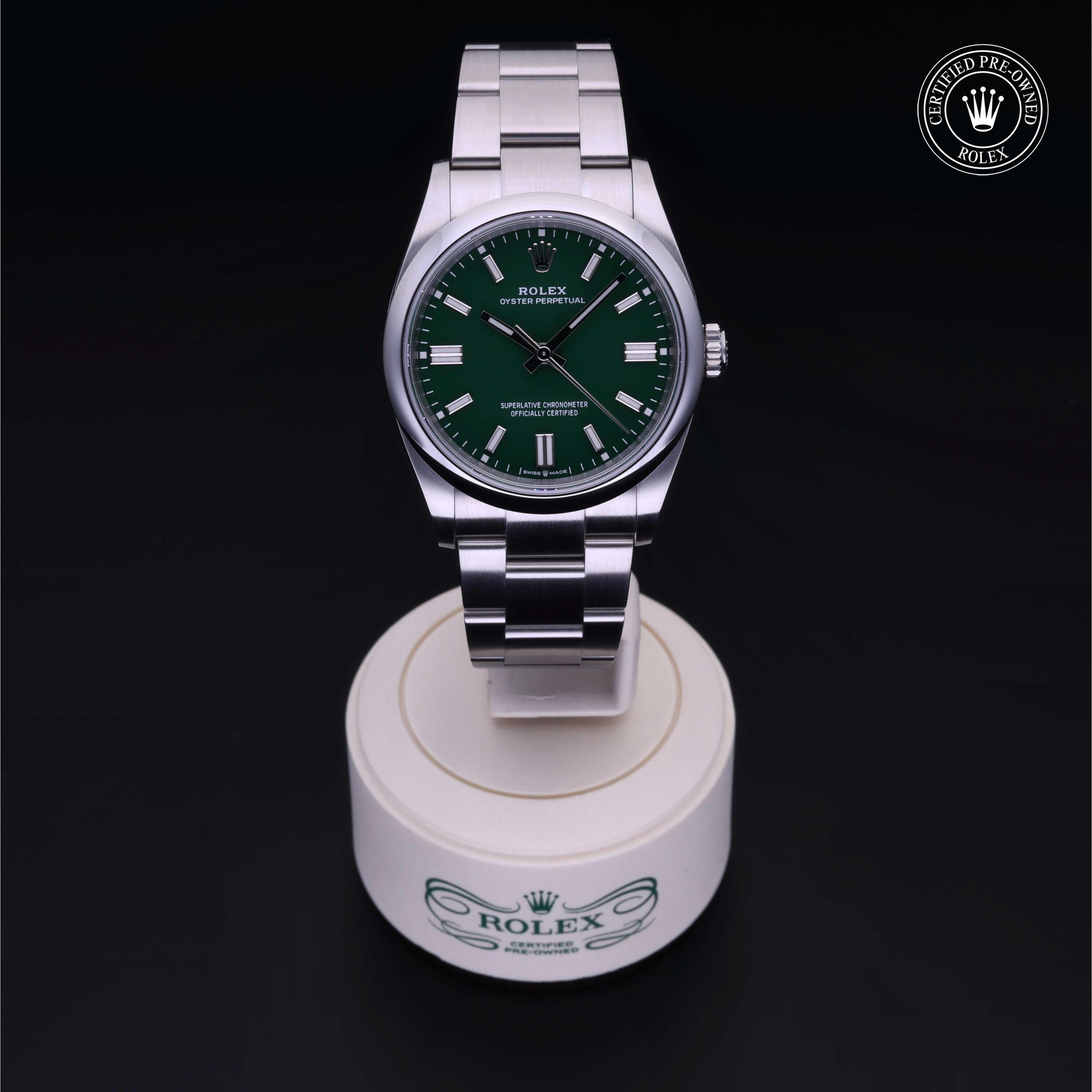 Rolex Certified Pre-owned Oyster Perpetual M126000-0005 front on black background