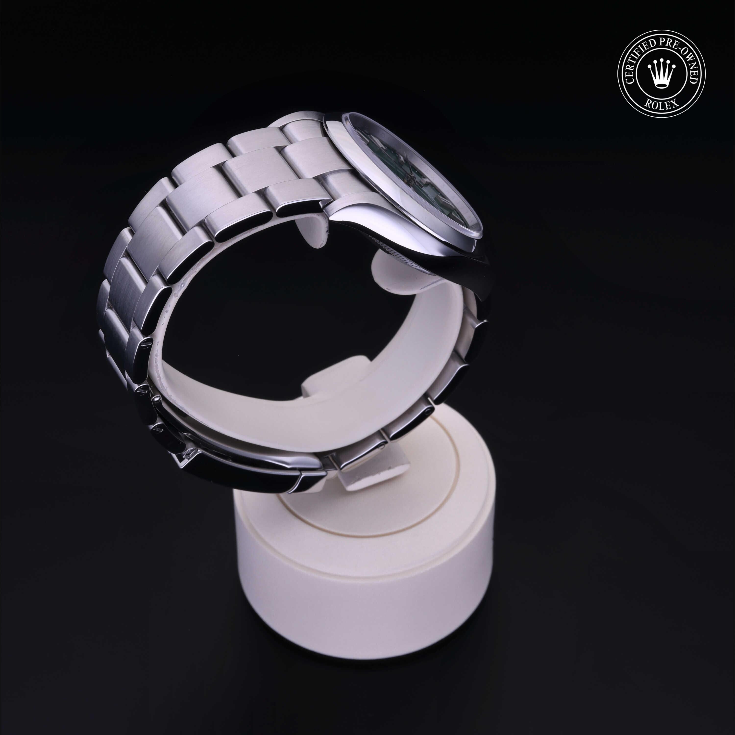 Rolex Certified Pre-owned Oyster Perpetual M126000-0005 front on black background