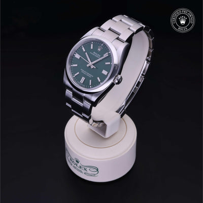 Rolex Certified Pre-owned Oyster Perpetual M126000-0005 front on black background