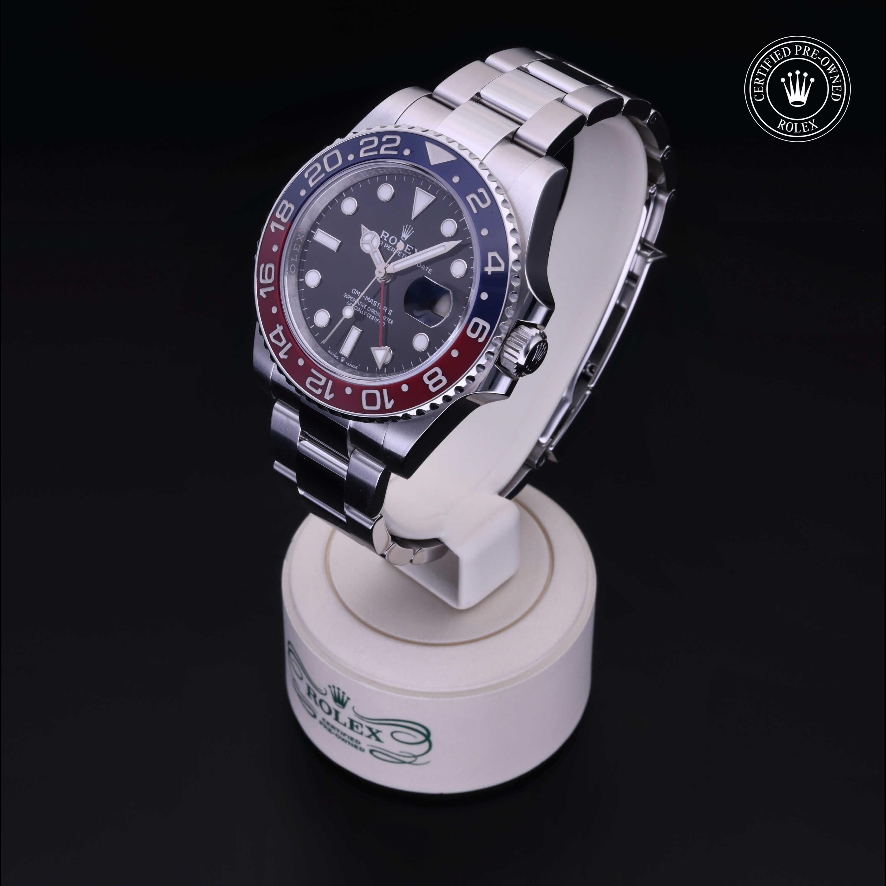 Rolex Certified Pre-owned GMT II M126710BLRO-0002 front on black background