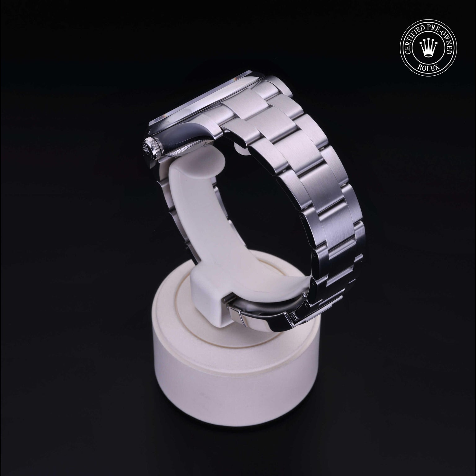 Rolex Certified Pre-owned Oyster Perpetual M116000-0011 front on black background