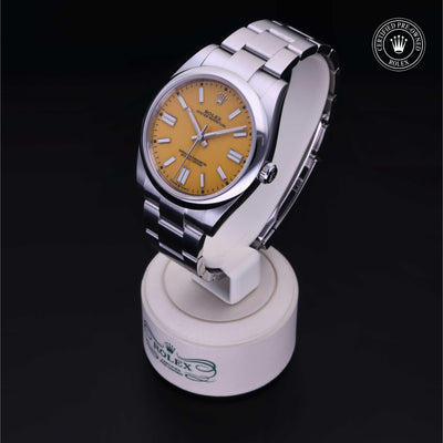 Rolex Certified Pre-owned Oyster Perpetual M124300-0004 front on black background