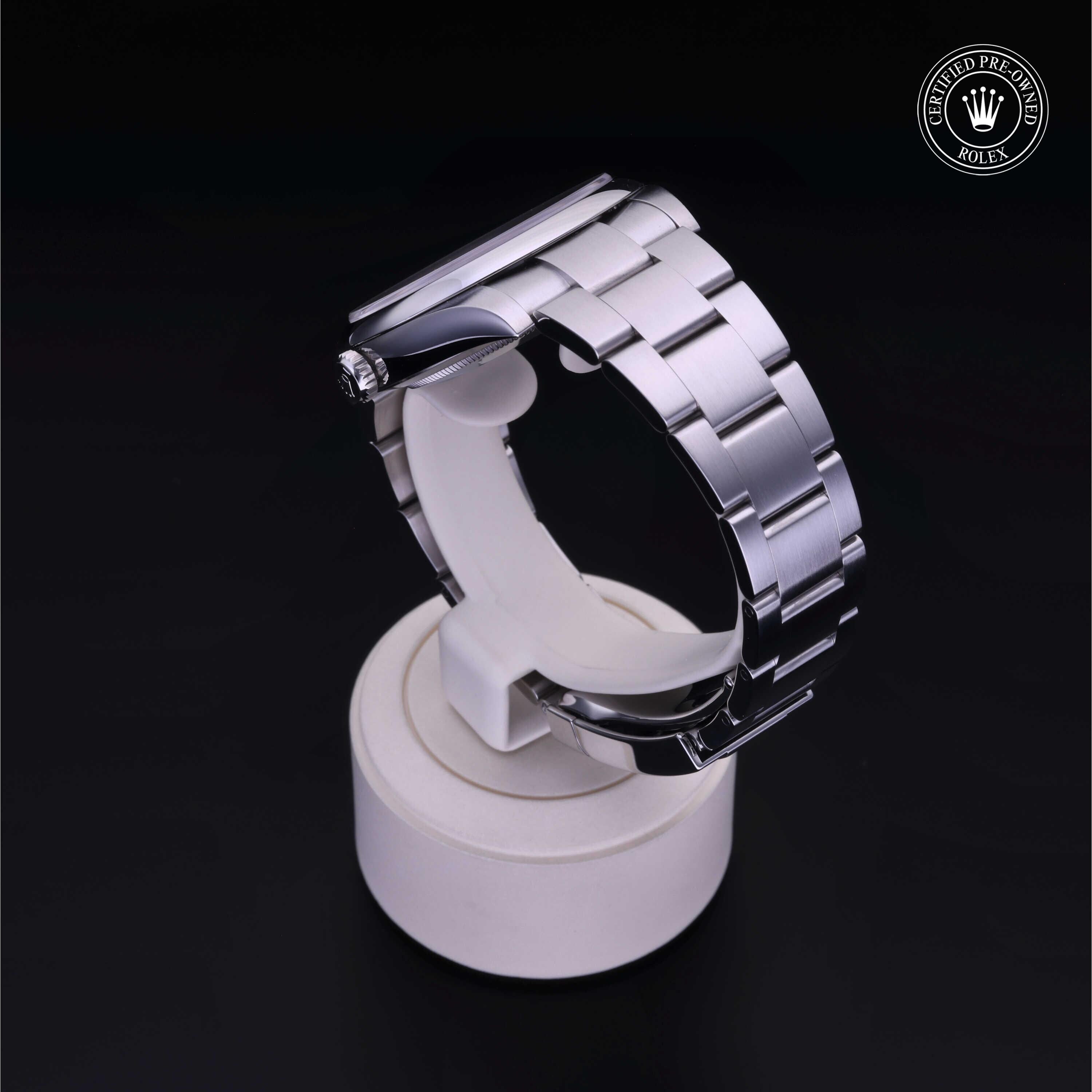 Rolex Certified Pre-owned Oyster Perpetual M124300-0004 front on black background