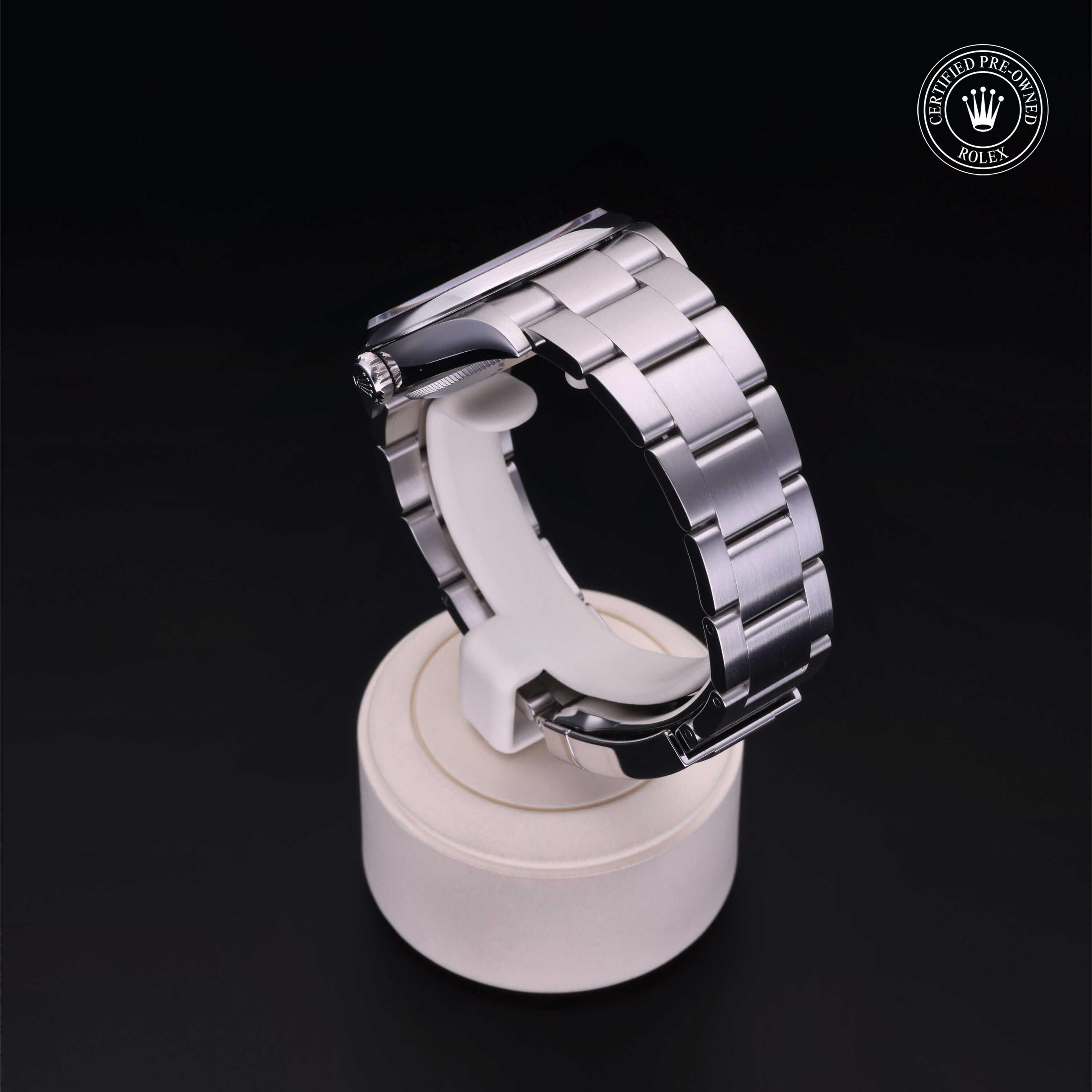 Rolex Certified Pre-owned Oyster Perpetual M126000-0002 front on black background