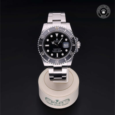 Rolex Certified Pre-owned Submariner M116610LN-0001 front on black background