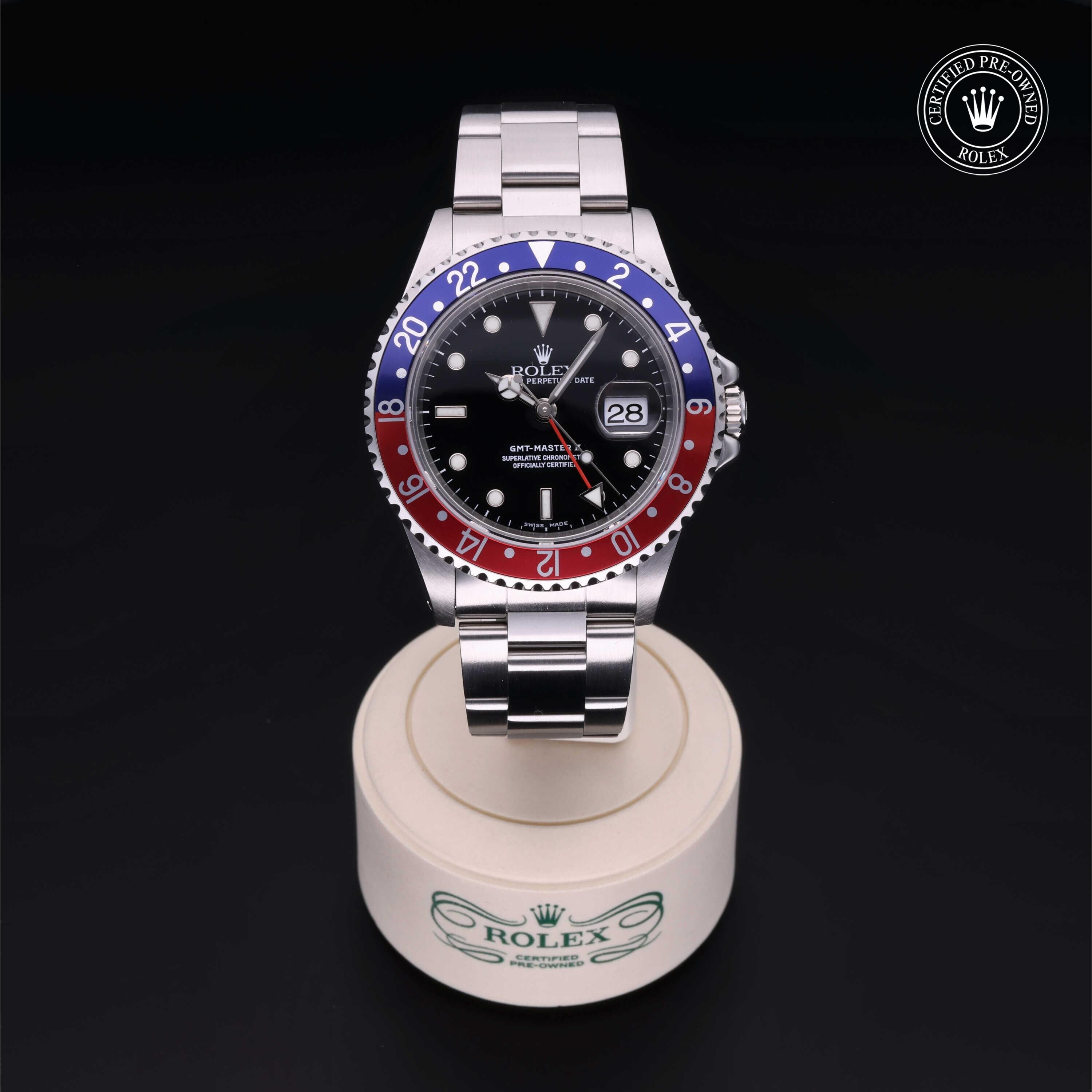 Rolex Certified Pre-owned GMT M16710BLRO-0005 front on black background