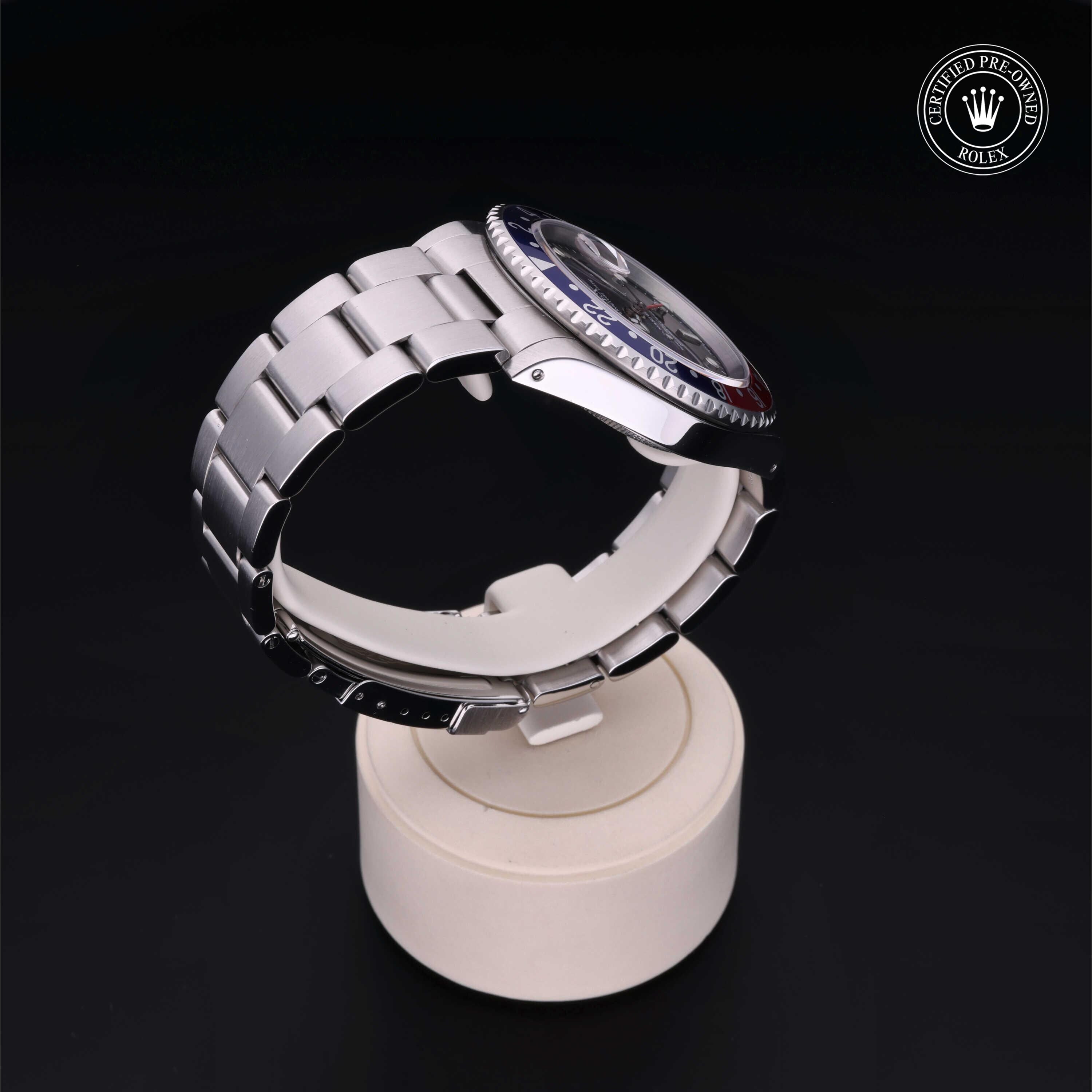 Rolex Certified Pre-owned GMT M16710BLRO-0005 front on black background