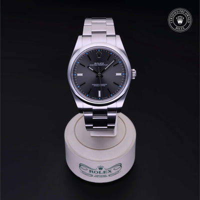 Rolex Certified Pre-owned Oyster Perpetual M114300-0001 front on black background