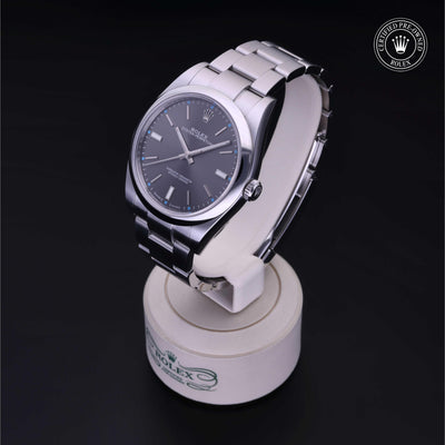 Rolex Certified Pre-owned Oyster Perpetual M114300-0001 front on black background
