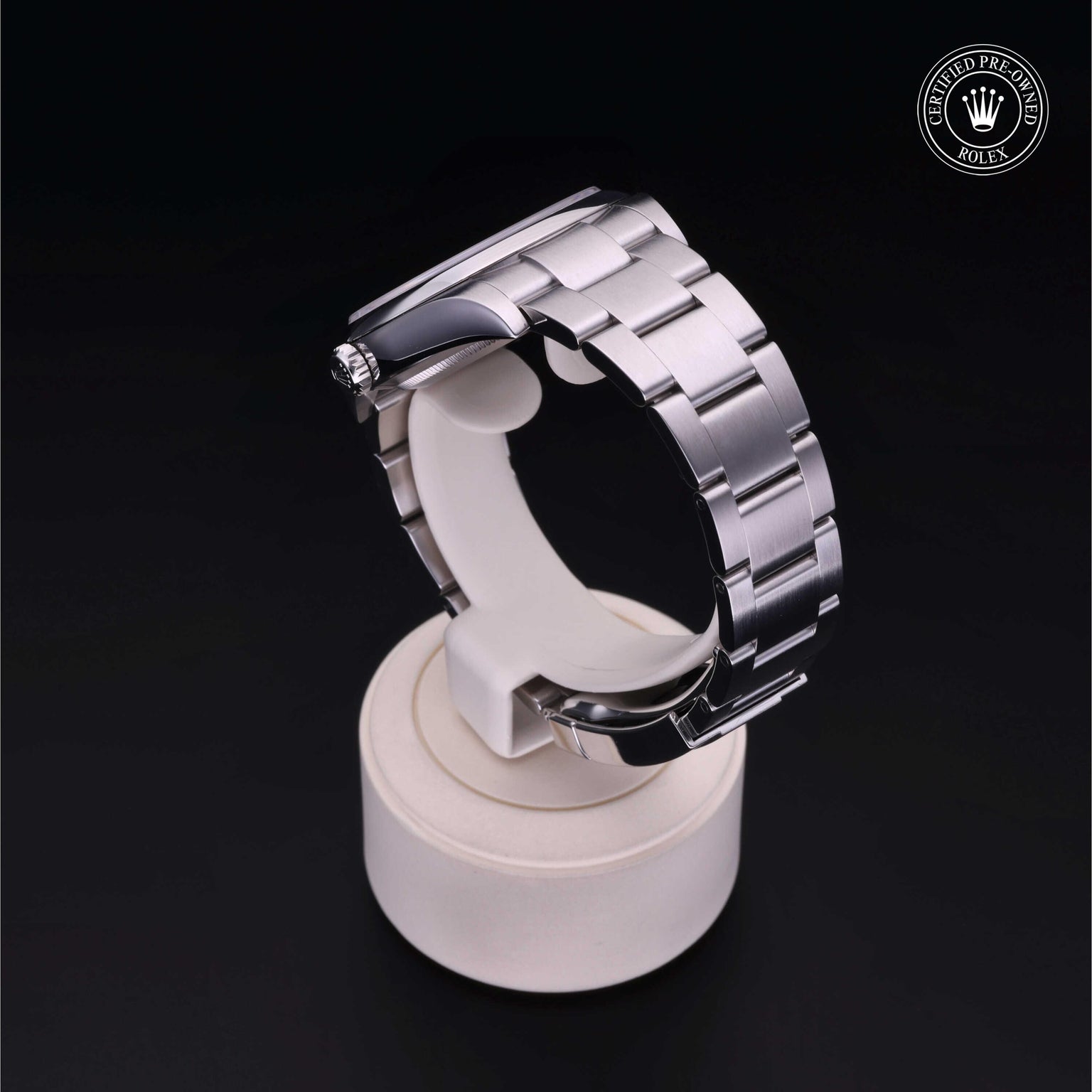 Rolex Certified Pre-owned Oyster Perpetual M114300-0003 front on black background