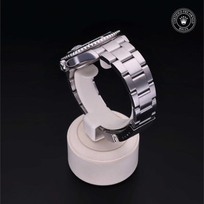 Rolex Certified Pre-owned Submariner M16610LV-0002 front on black background