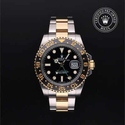 Rolex Certified Pre-owned GMT M116713LN-0001 front on black background