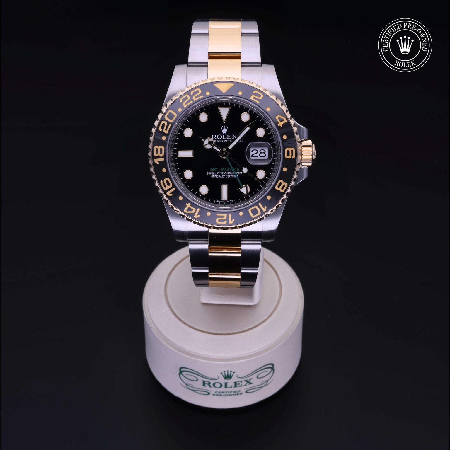Rolex Certified Pre-owned GMT M116713LN-0001 front on black background