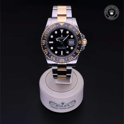 Rolex Certified Pre-owned GMT M116713LN-0001 front on black background