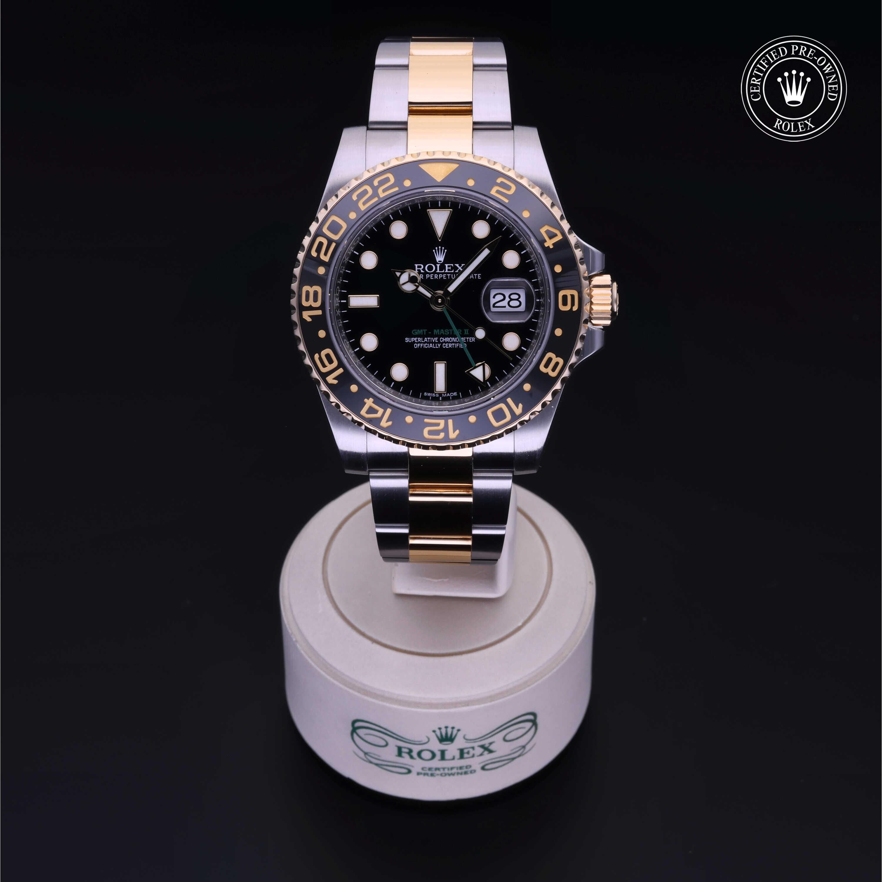 Rolex Certified Pre-owned GMT M116713LN-0001 front on black background