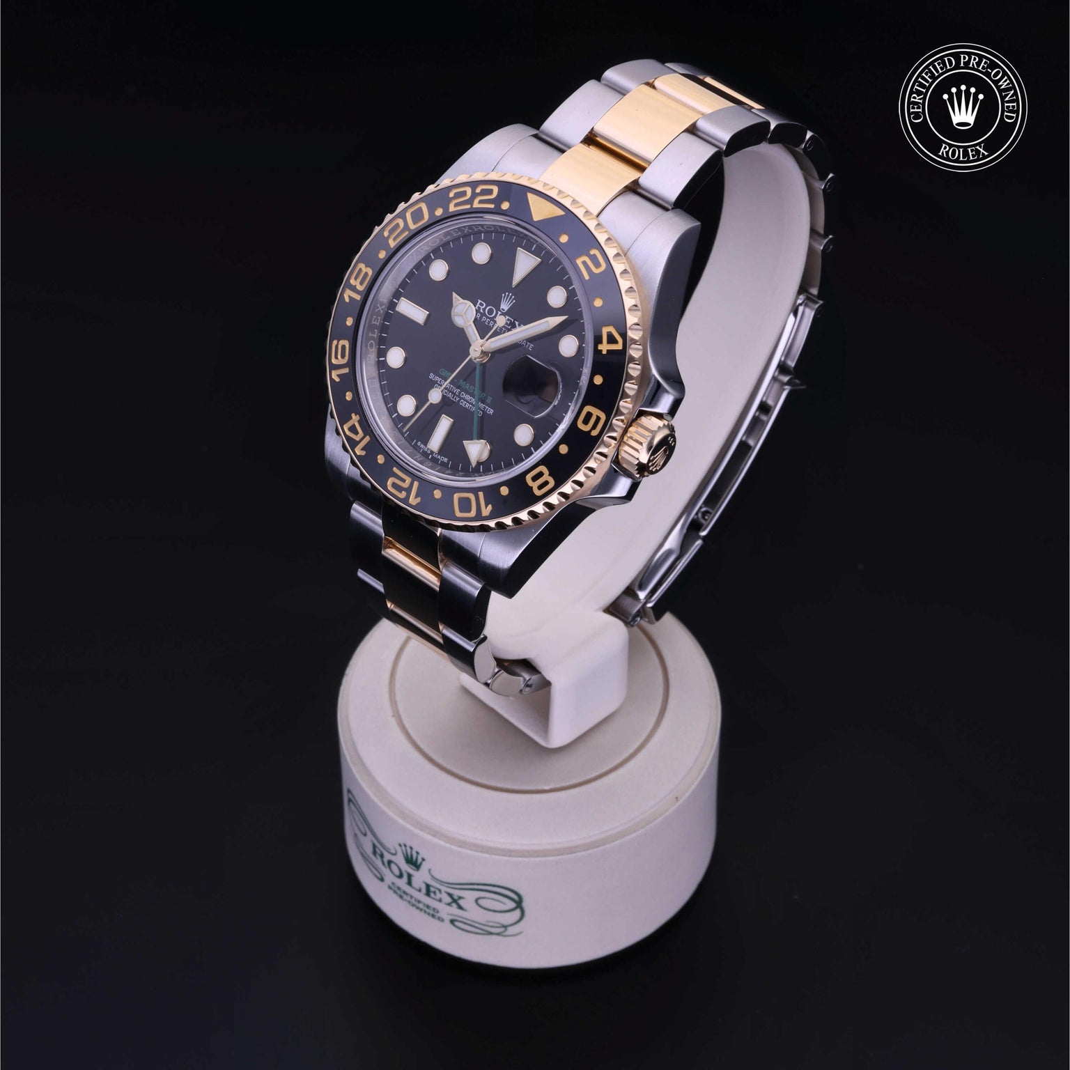 Rolex Certified Pre-owned GMT M116713LN-0001 front on black background