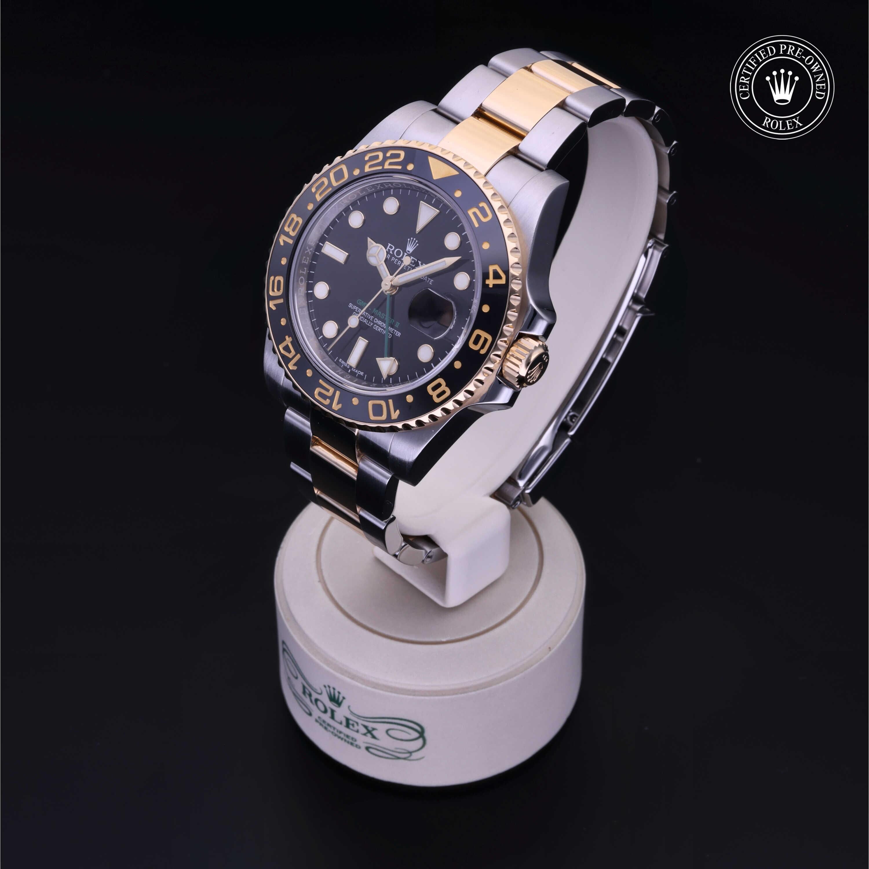 Rolex Certified Pre-owned GMT M116713LN-0001 front on black background
