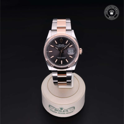 Rolex Certified Pre-owned Datejust M126231-0014 front on black background