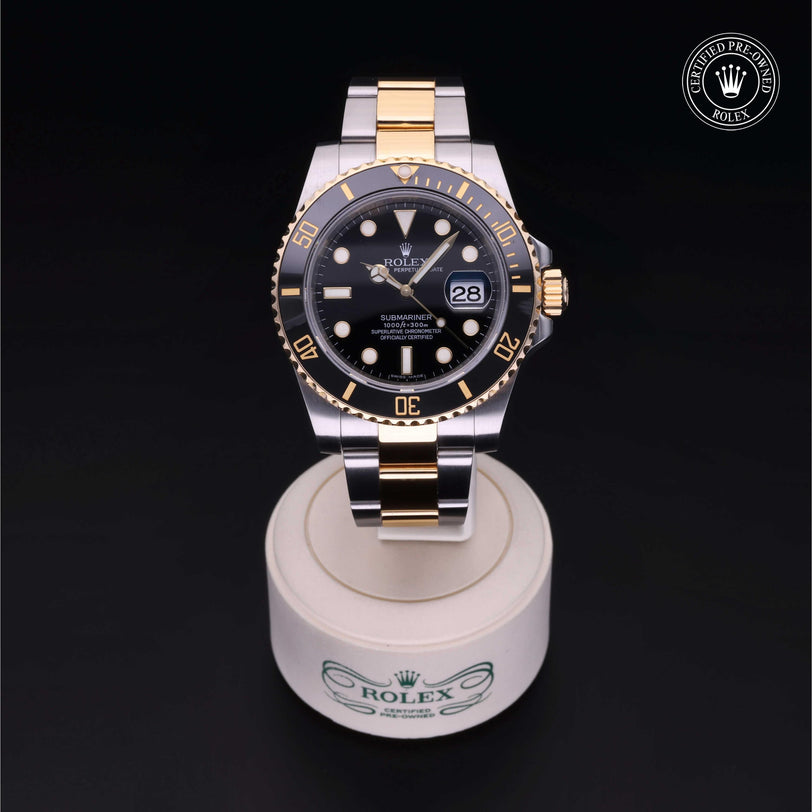 Rolex Certified Pre-owned Submariner M116613LN-0001 front on black background