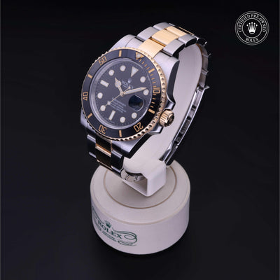 Rolex Certified Pre-owned Submariner M116613LN-0001 front on black background