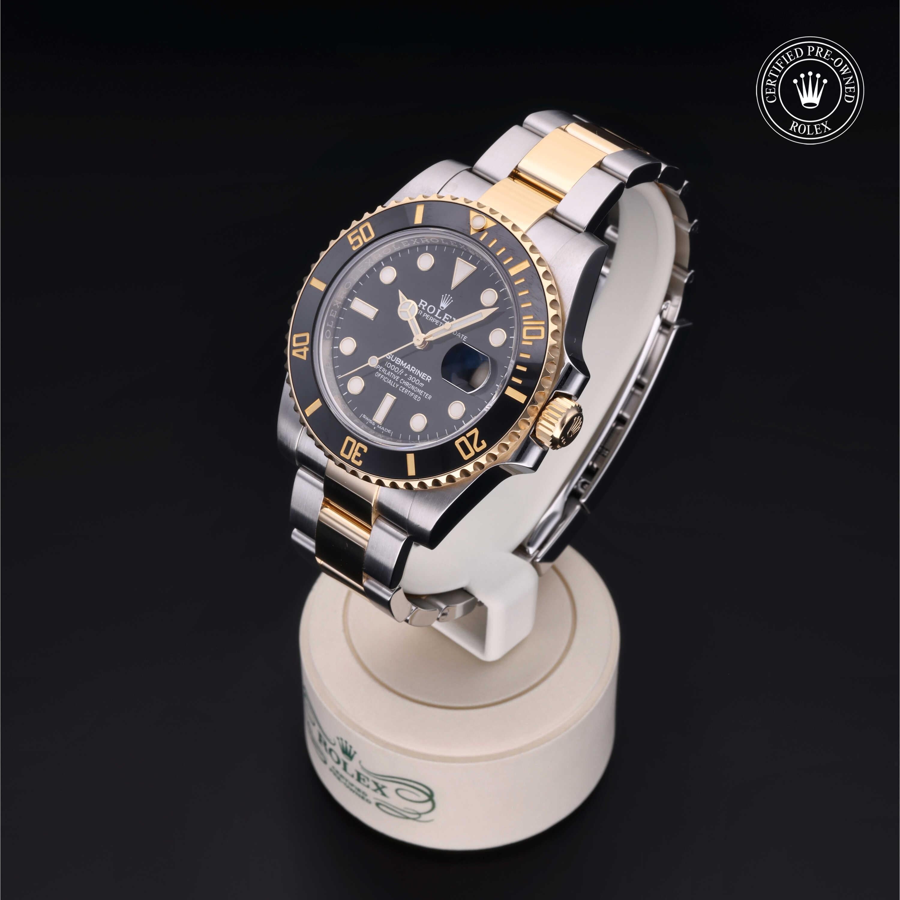 Rolex Certified Pre-owned Submariner M116613LN-0001 front on black background