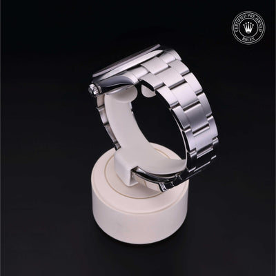 Rolex Certified Pre-owned Oyster Perpetual M124300-0004 front on black background