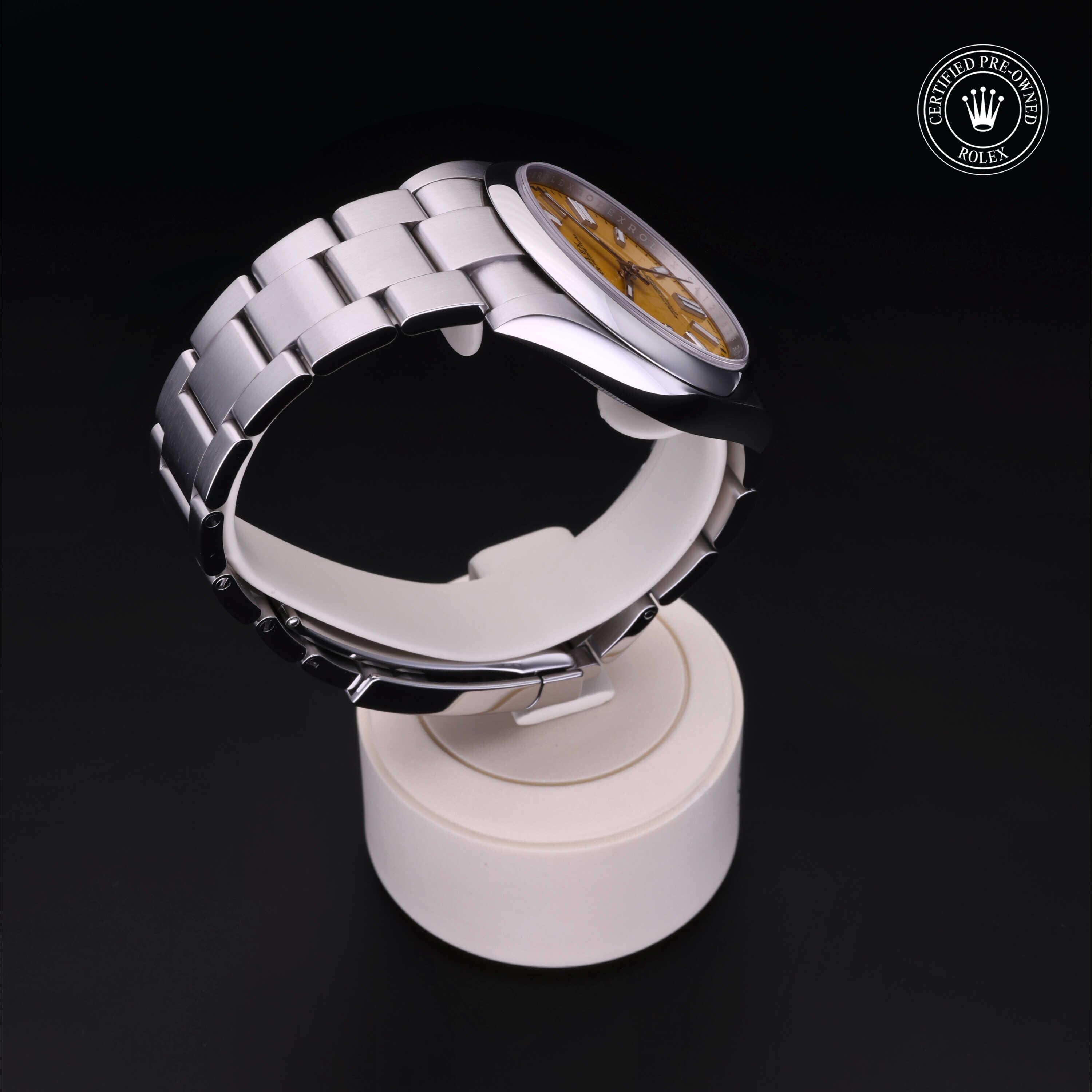 Rolex Certified Pre-owned Oyster Perpetual M124300-0004 front on black background