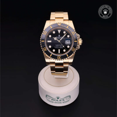 Rolex Certified Pre-owned Submariner M116618LN-0001 front on black background