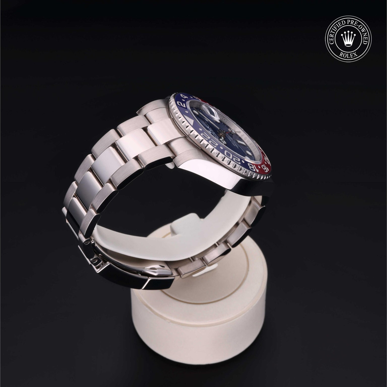 Rolex Certified Pre-owned GMT M126719BLRO-0003 front on black background