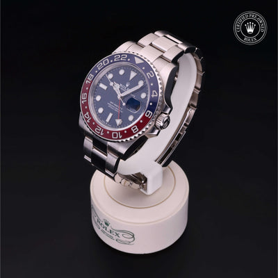 Rolex Certified Pre-owned GMT M126719BLRO-0003 front on black background
