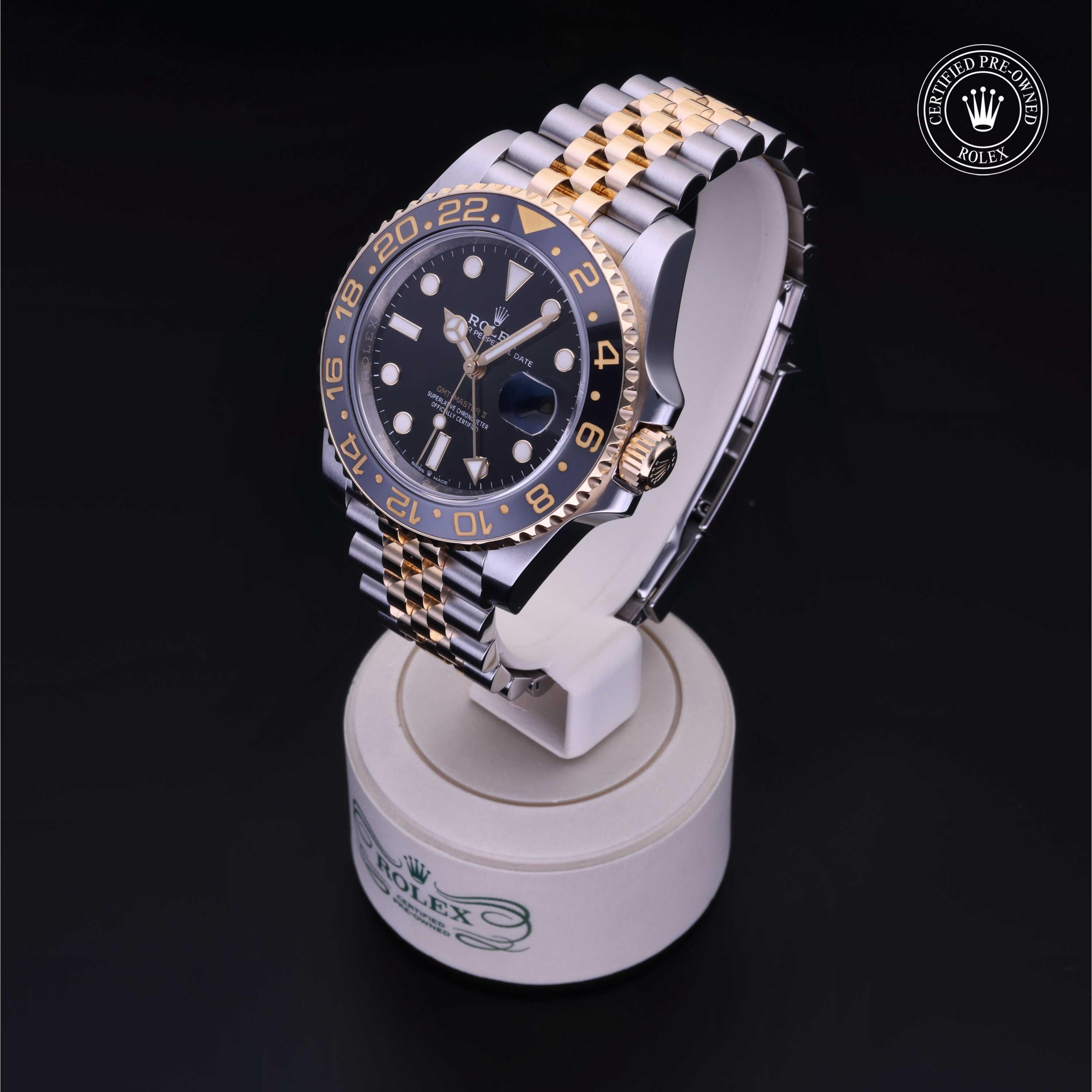 Rolex Certified Pre-owned GMT M126713GRNR-0001 front on black background