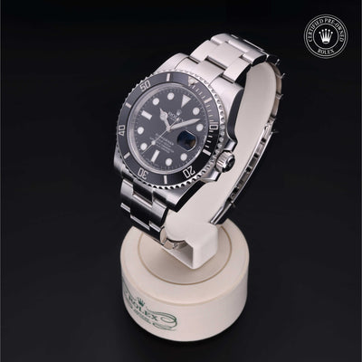 Rolex Certified Pre-owned Submariner M116610LN-0001 front on black background