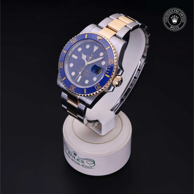 Rolex Certified Pre-owned Submariner M116613LB-0005 front on black background
