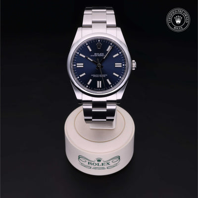 Rolex Certified Pre-owned Oyster Perpetual M124300-0003 front on black background