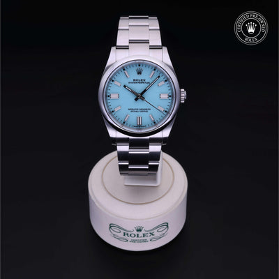 Rolex Certified Pre-owned Oyster Perpetual M126000-0006 front on black background