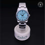 Rolex Certified Pre-owned Oyster Perpetual M126000-0006 front on black background