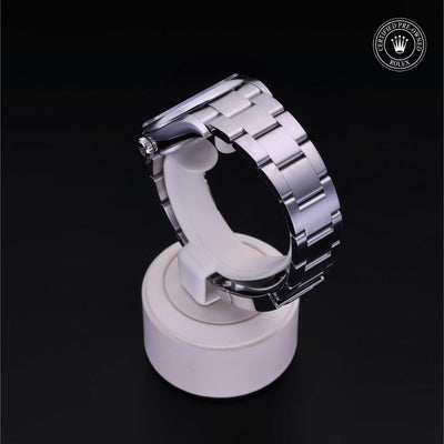 Rolex Certified Pre-owned Oyster Perpetual M126000-0006 front on black background