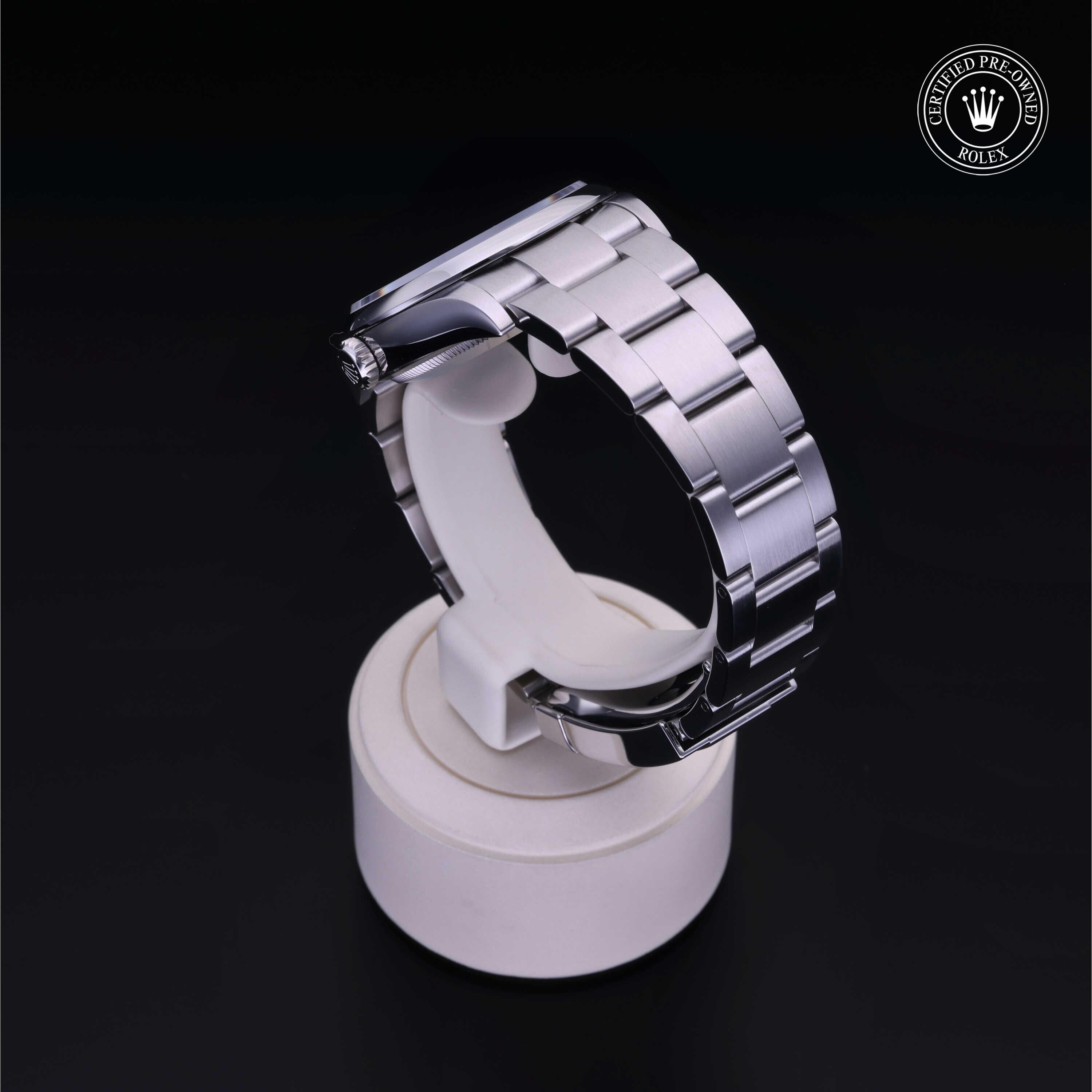 Rolex Certified Pre-owned Oyster Perpetual M126000-0006 front on black background