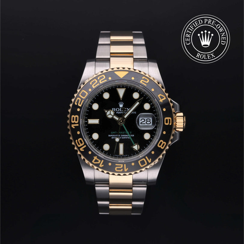 Rolex Certified Pre-owned GMT M116713LN-0001 front on black background