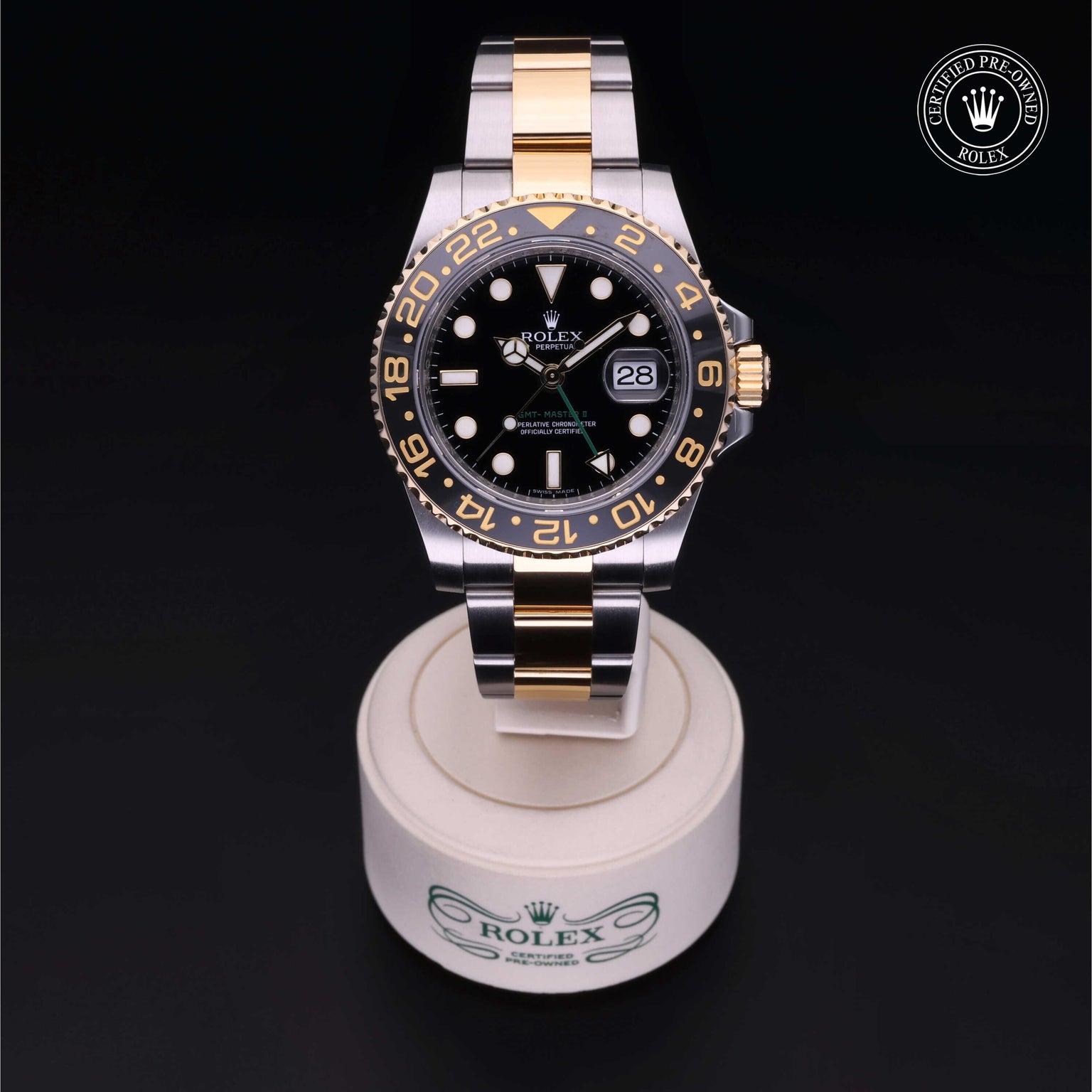 Rolex Certified Pre-owned GMT M116713LN-0001 front on black background