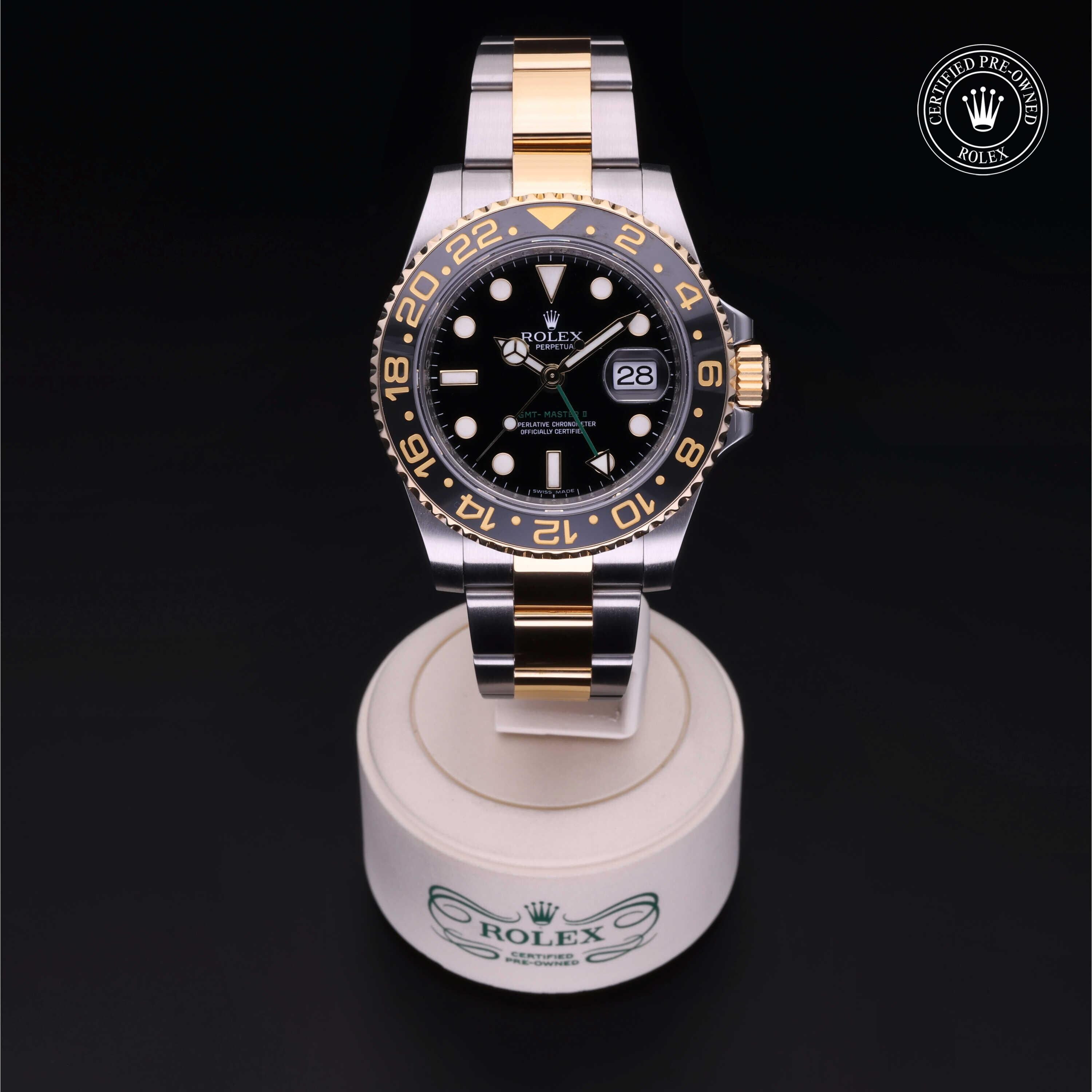 Rolex Certified Pre-owned GMT M116713LN-0001 front on black background
