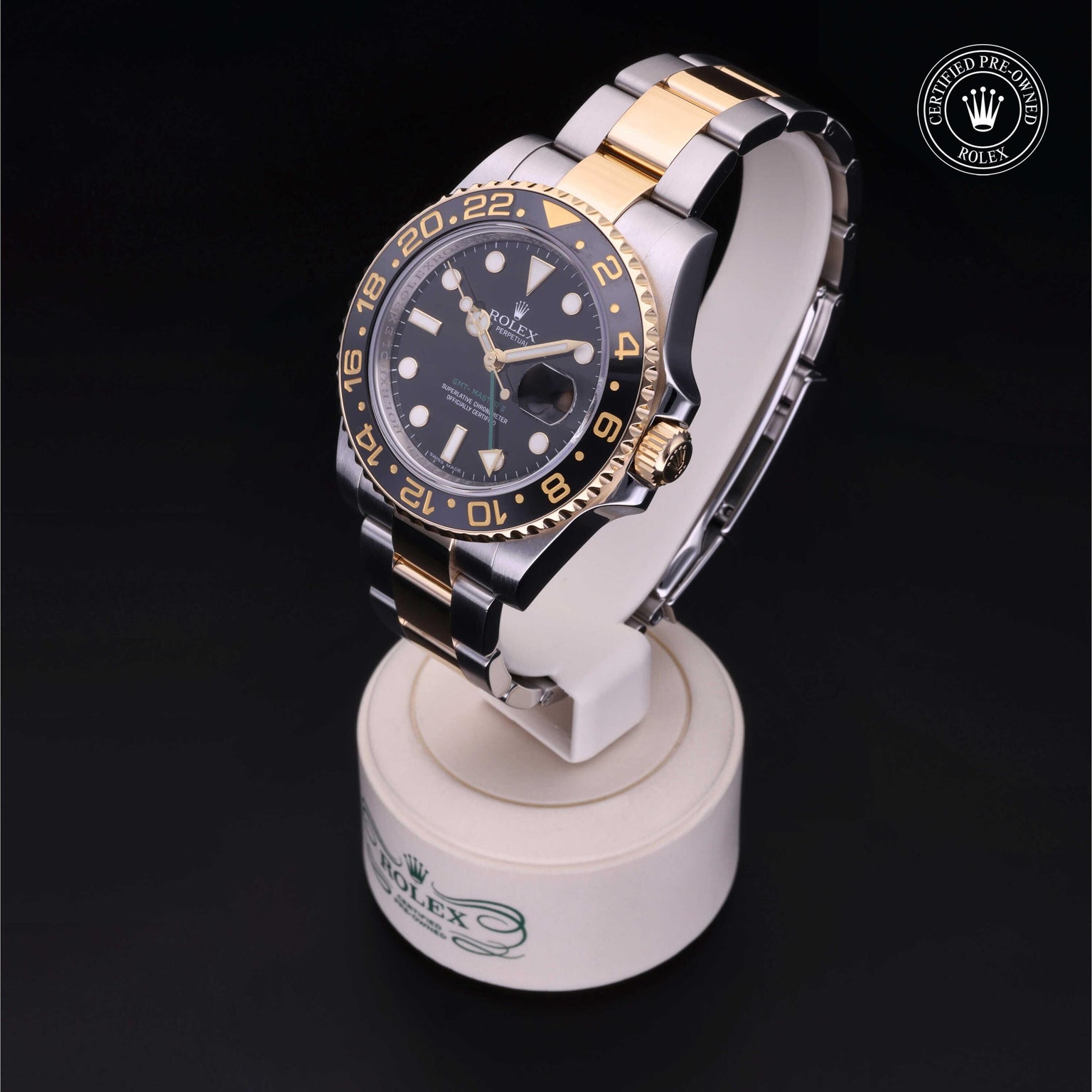 Rolex Certified Pre-owned GMT M116713LN-0001 front on black background