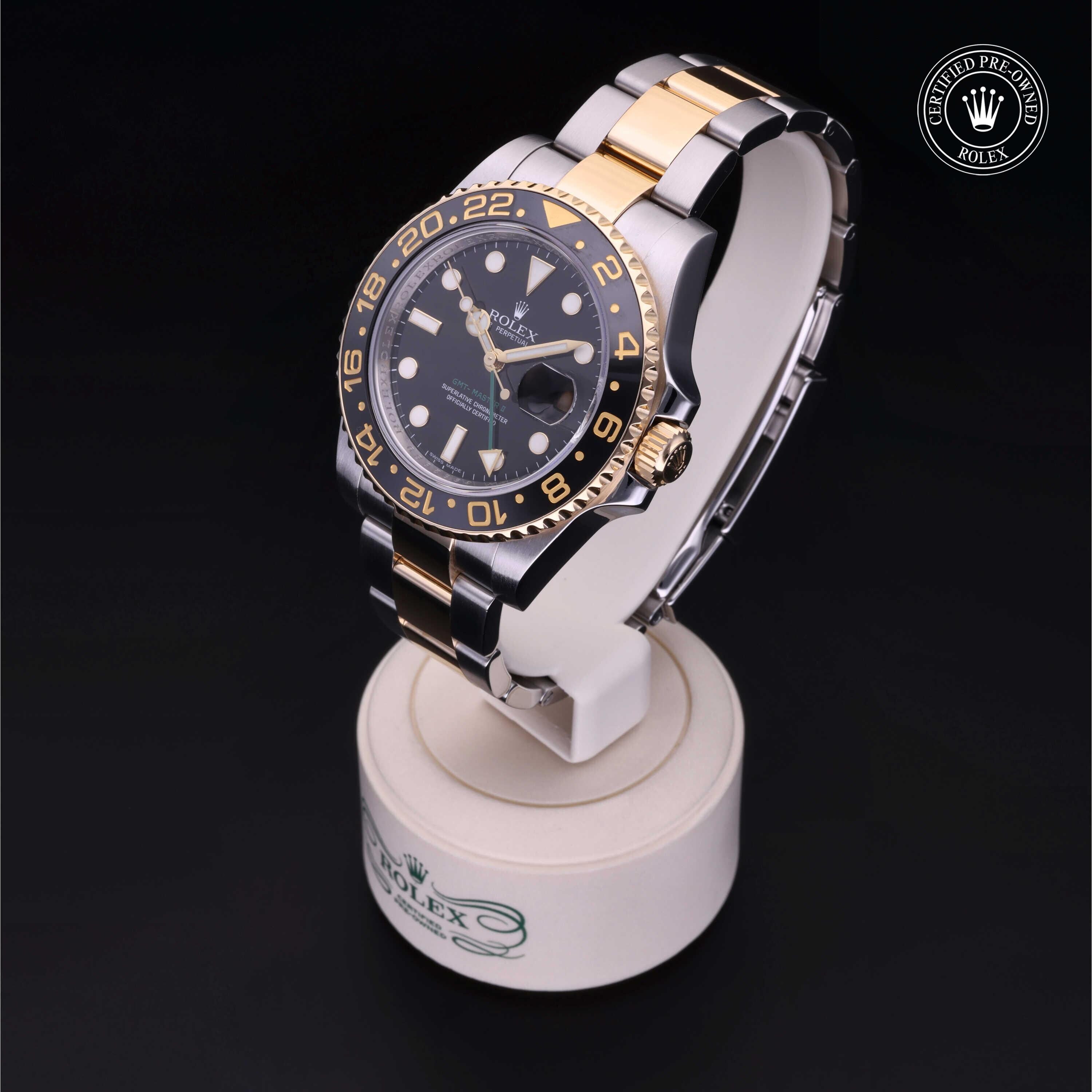 Rolex Certified Pre-owned GMT M116713LN-0001 front on black background