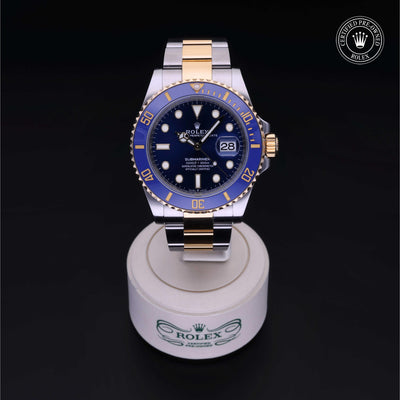 Rolex Certified Pre-owned Submariner M126613LB-0002 front on black background