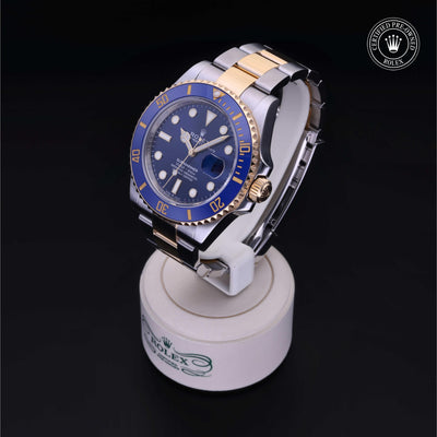 Rolex Certified Pre-owned Submariner M126613LB-0002 front on black background